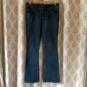 CAbi boot cut flap pockets blue jeans style 638L sz 8